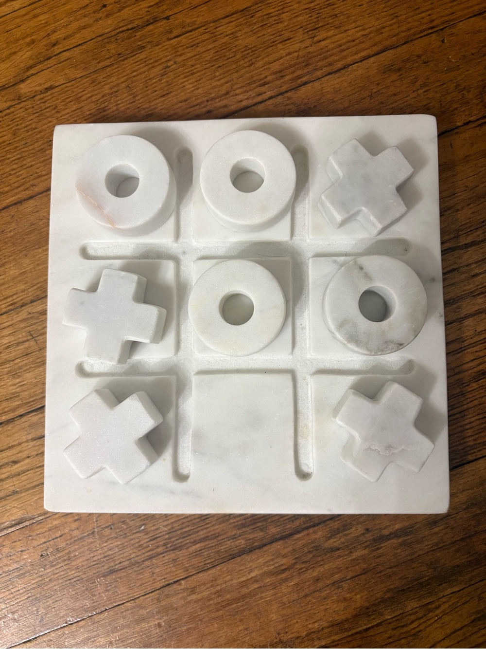 Crate&Barrel White Marble Tic Tac Toe Set with Carved X and O Pieces